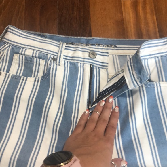 Blue and white American Eagle skinny jeans. - Picture 3 of 4